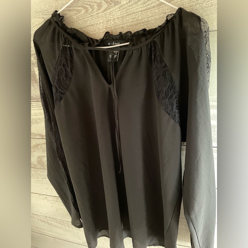 Women’s dress shirt.